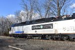 Rear side view of ALP-45DP # 4511 with a Coast Guard sign on it-this locomotive is the power for NJT Train # 5175 as it is about to depart White House